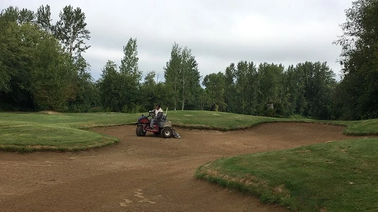 Avalon Golf Club has removed handheld bunker rakes in response to COVID-19 and uses a mechanical rake to smooth the hazards before play. 