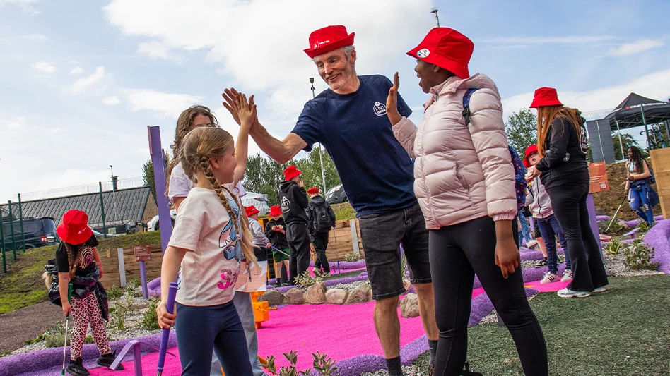 Members of St Paul’s Youth Forum play adventure golf at the launch of Golf It! in Glasgow.
