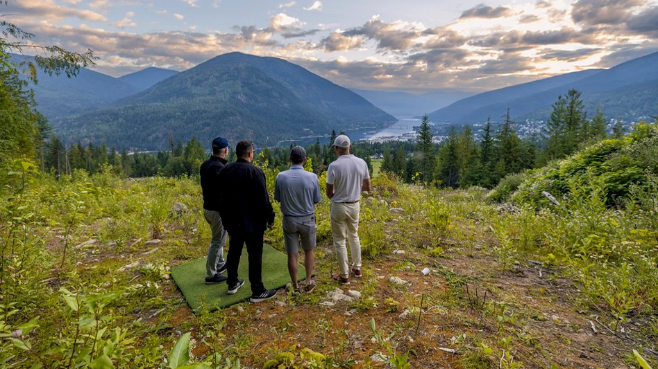 Four men stand on the site that will soon be The Dodger at Hallo Nelson, a golf course in British Columbia.