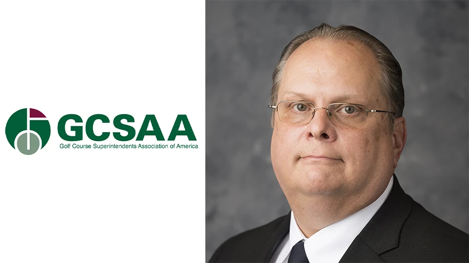GCSAA environmental programs director Mark Johnson next to the association's logo.