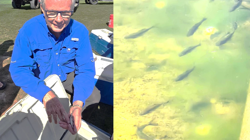 Dr. Joseph Platt poses with a Virgin River chub.