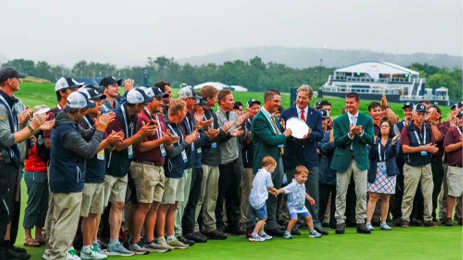 Oakmont Country Club grounds superintendent Michael McCormick receives the E.J. Marshall Platter after the U.S. Open.