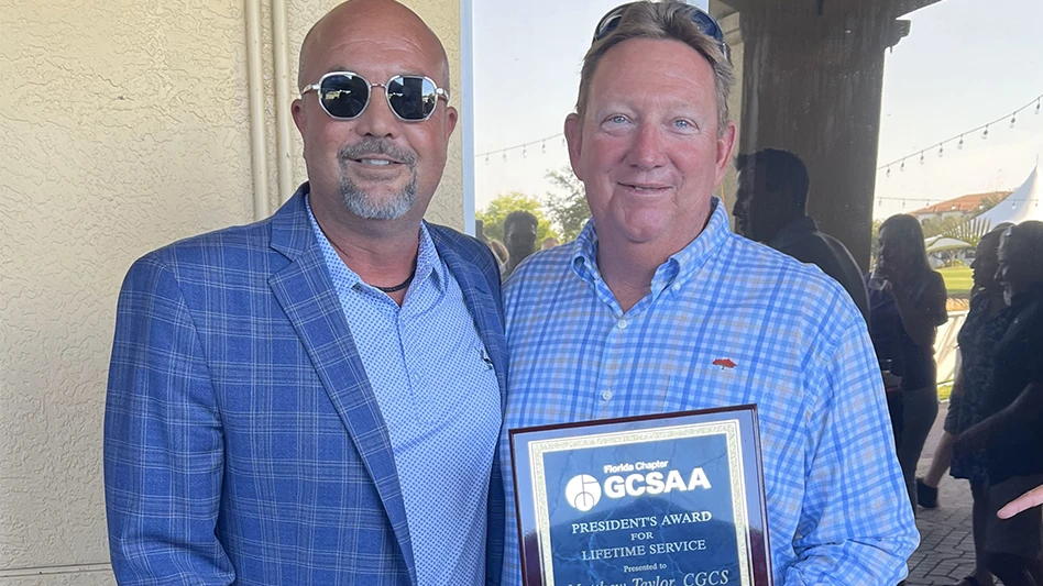 Florida GCSA president Jason Zimmerman, CGCS, with President’s Award for Lifetime Service winner, Matt Taylor, CGCS