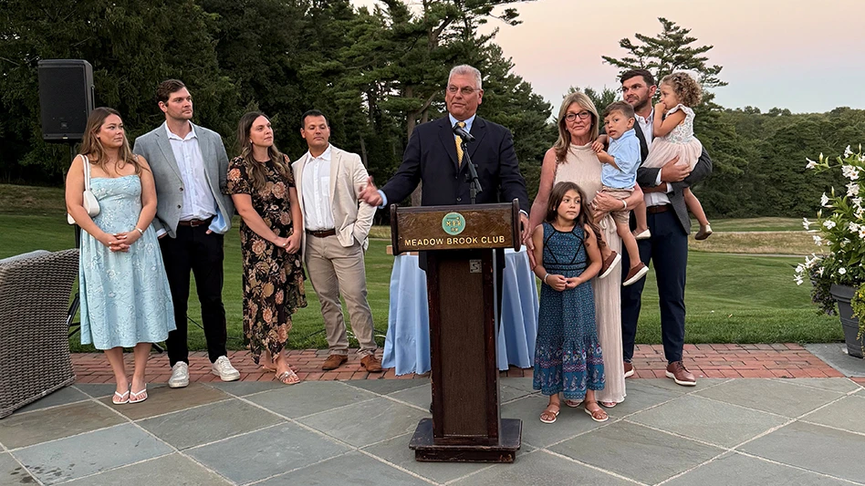 John Carlone giving his retirement speech